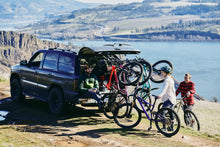 Lolo Rack - The best 6 bike vertical rack, with mountain bikes next to a lake