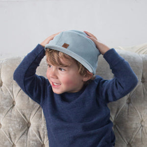 Kid with blue corduroy 5 panel kids hat by XS Unified