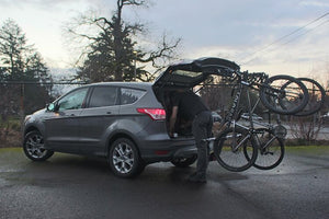 Lolo Rack with dirt jumper and mountain bike - The best 6 bike vertical rack in grey
