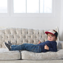 Kids 5 panel hat earth colour block on boy on couch