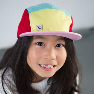 Kids 5 panel hat pastel colour block on girl